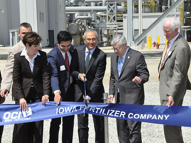 Nassef Sawiris, CEO of OCI N.V., (center, holding scissors) cuts the ribbon officially opening the Iowa Fertilizer Company nitrogen facility near Wever, Iowa, on Wednesday. The plant is the first newly constructed nitrogen-producing facility in the U.S. in 25 years. (DTN photo by Russ Quinn)